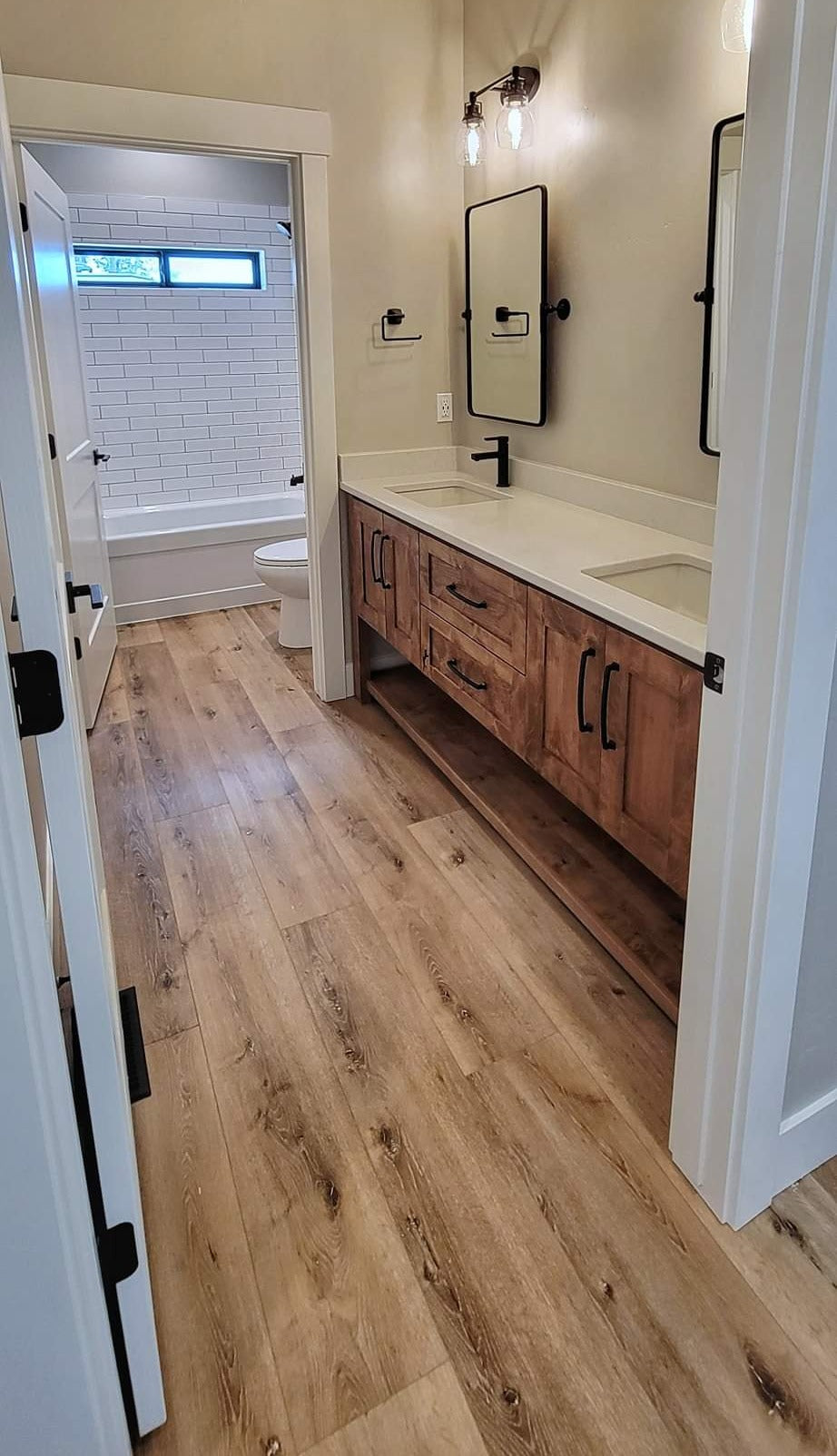 Photo of Hewn Cayenne Premium Stoneform Plank Flooring in a Bathroom