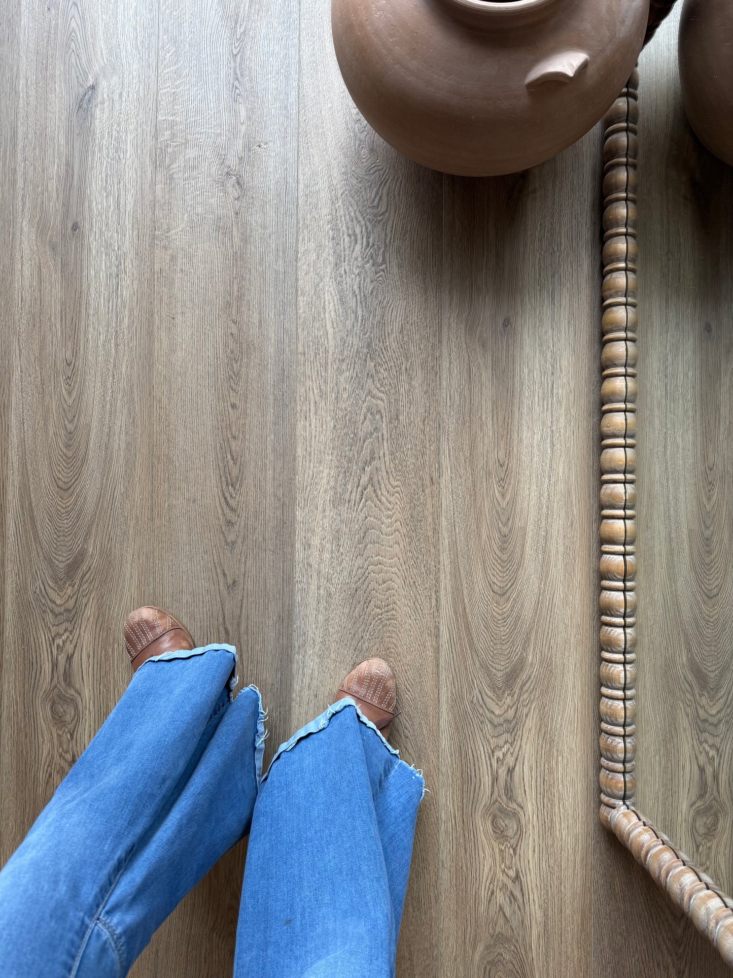 A Top-Down Photo of Hewn Floor Color Archer in the Galey Alix Elite Stoneform Luxury Vinyl Plank Collection