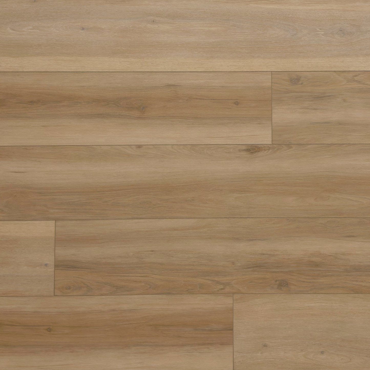 A top-down photo of the flooring color Arbor from the Hewn Floor Premium Stoneform Luxury Plank Flooring Collection