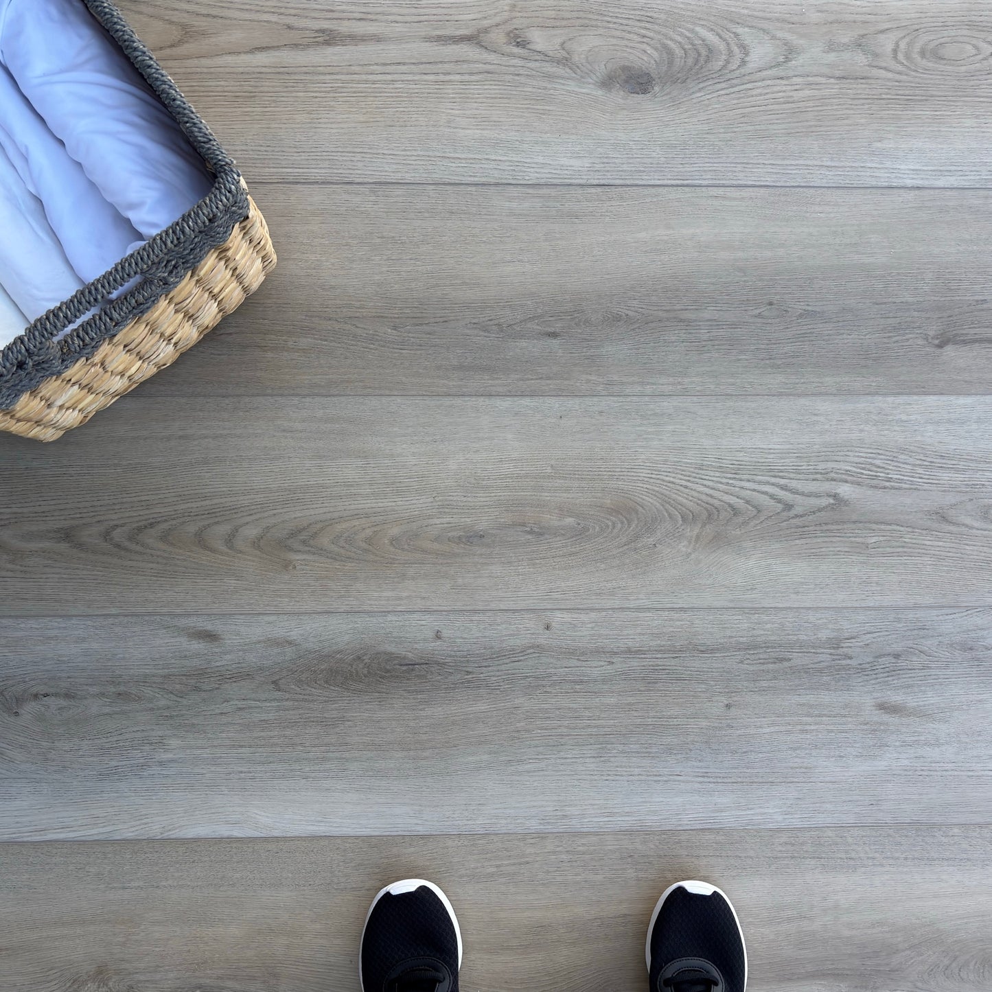 A top-down photo of the flooring color Beam from the Hewn Floor Elite Stoneform Luxury Plank Flooring Collection