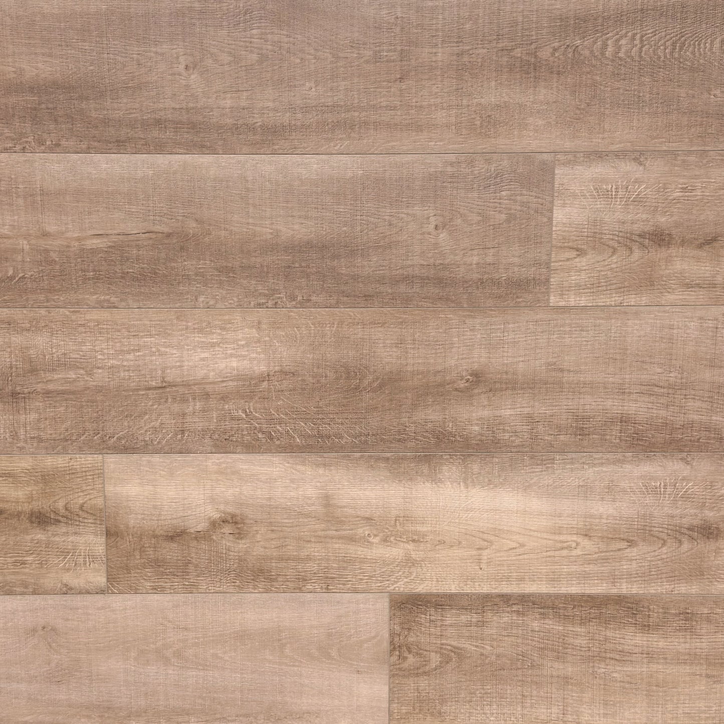 A top-down photo of the flooring color Burl from the Hewn Floor Premium Stoneform Luxury Plank Flooring Collection