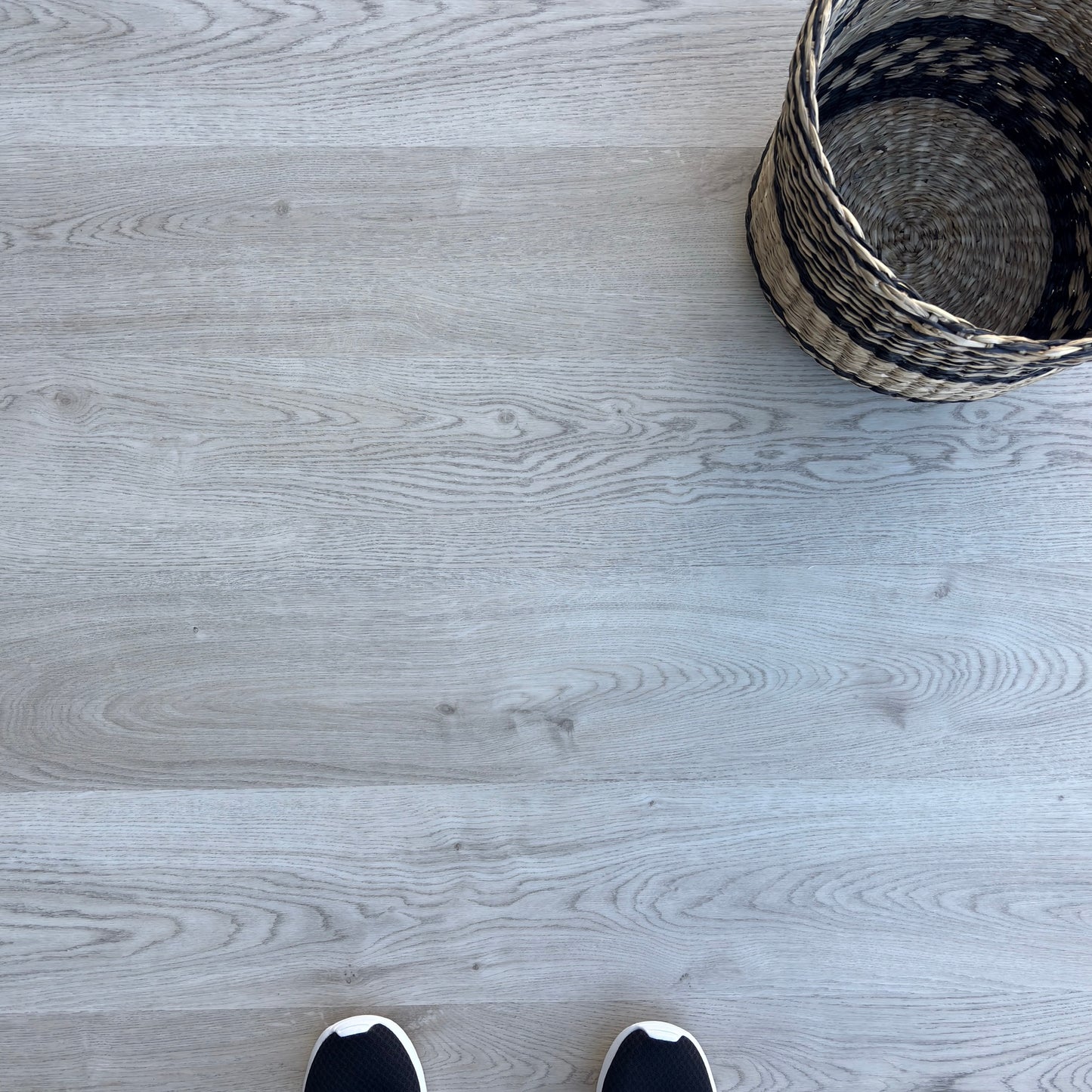 A top-down photo of the flooring color Elk from the Hewn Floor Angela Rose Select Stoneform Luxury Plank Flooring Collection