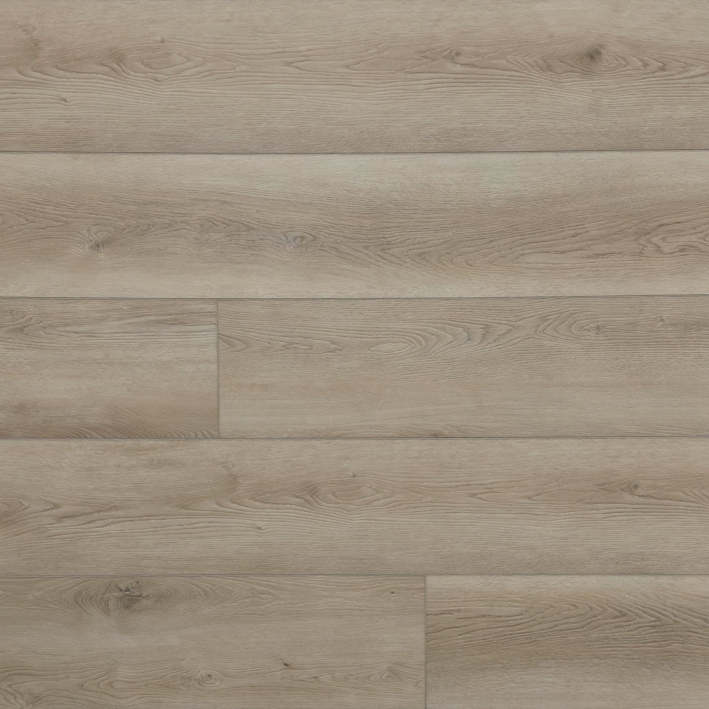 A photo swatch of the flooring color Shore from the Hewn Floor Angela Rose Elite Stoneform Luxury Plank Flooring Collection