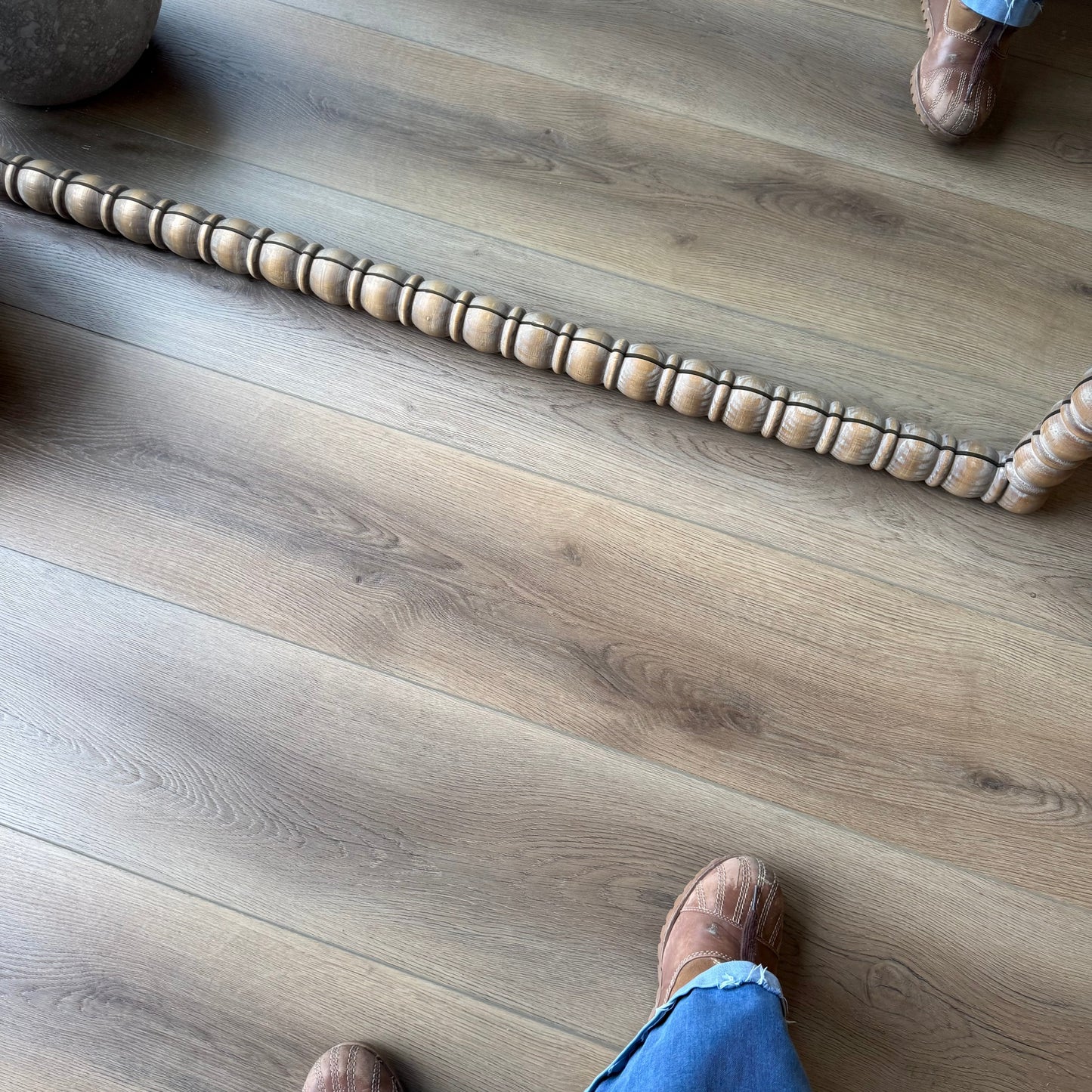 A photo of Hewn Floor Sutterlin from the Galey Alix Elite Stoneform Collection.