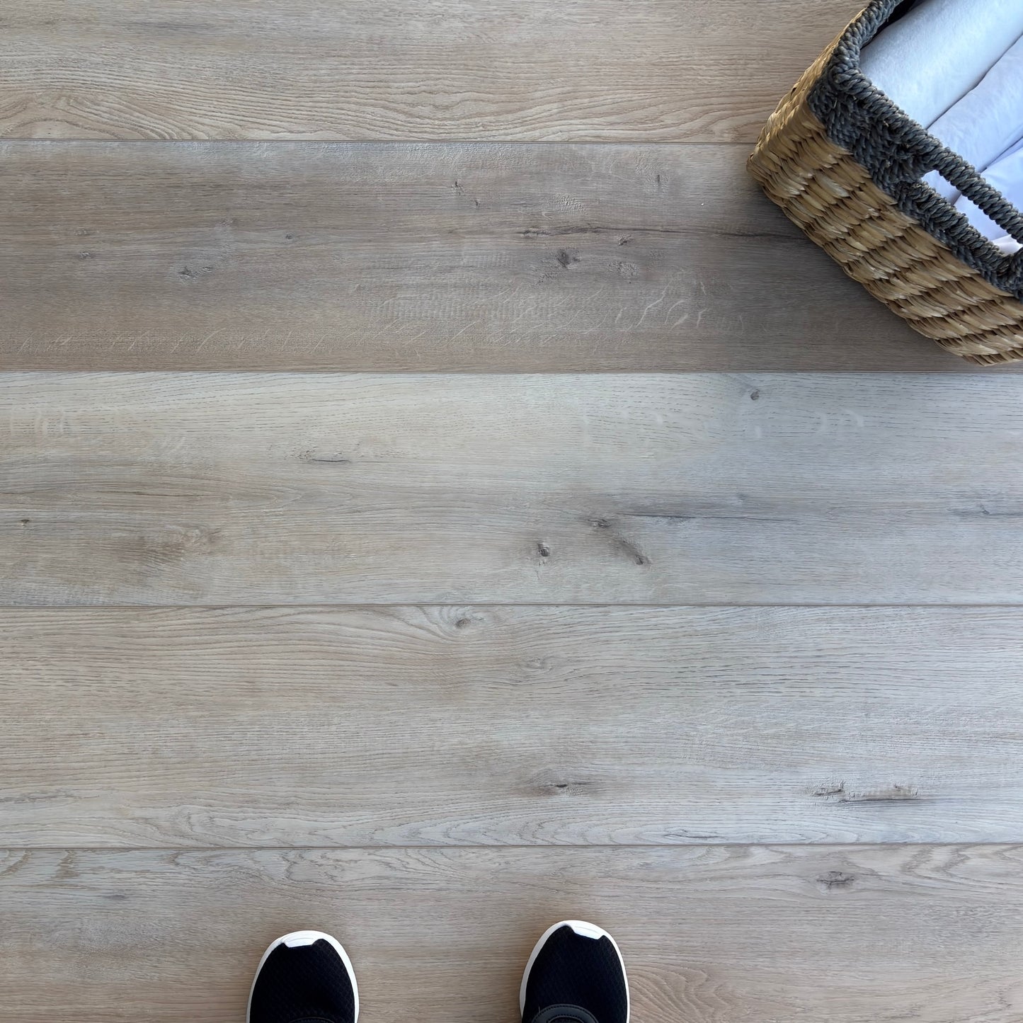 A top-down photo of the flooring color Teebar from the Hewn Floor Elite Stoneform Luxury Plank Flooring Collection