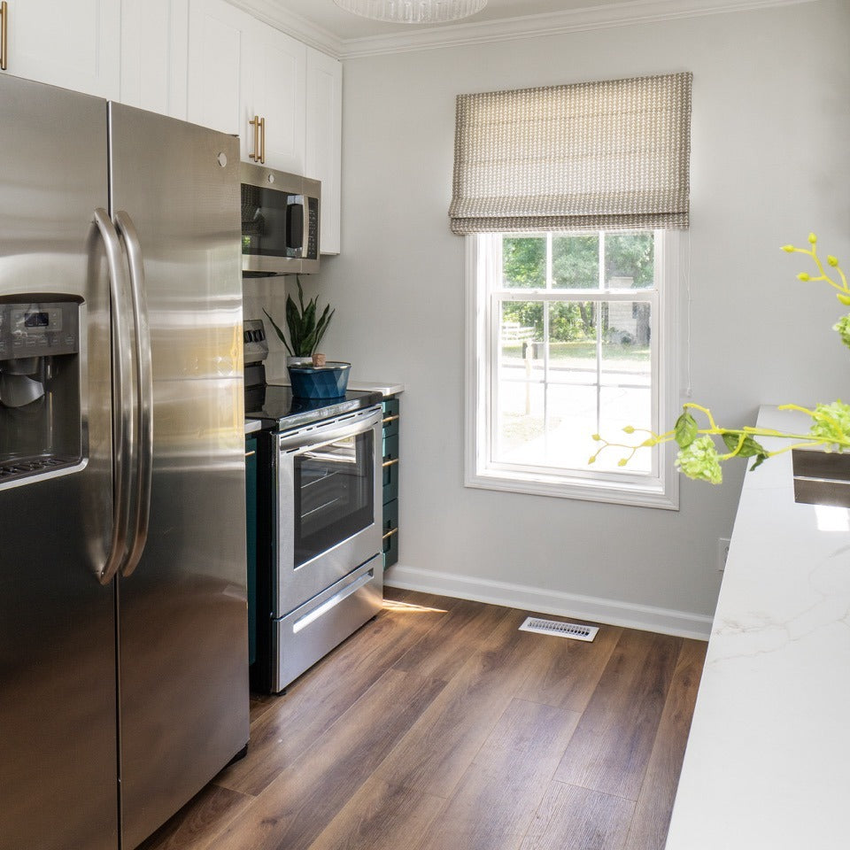 Photo of Hewn Gusset Premium Stoneform Plank Flooring in a Kitchen