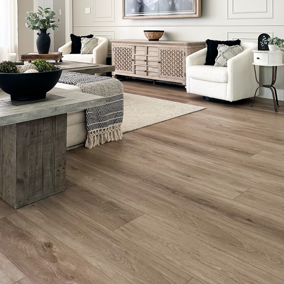 A living room scene featuring Angela Rose Elite Austin Hewn Stoneform luxury flooring