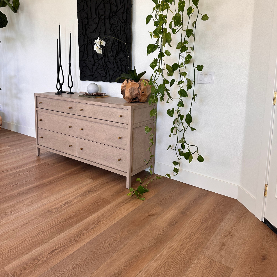 A bedroom featuring Angela Rose Elite Hender Hewn Stoneform luxury flooring.