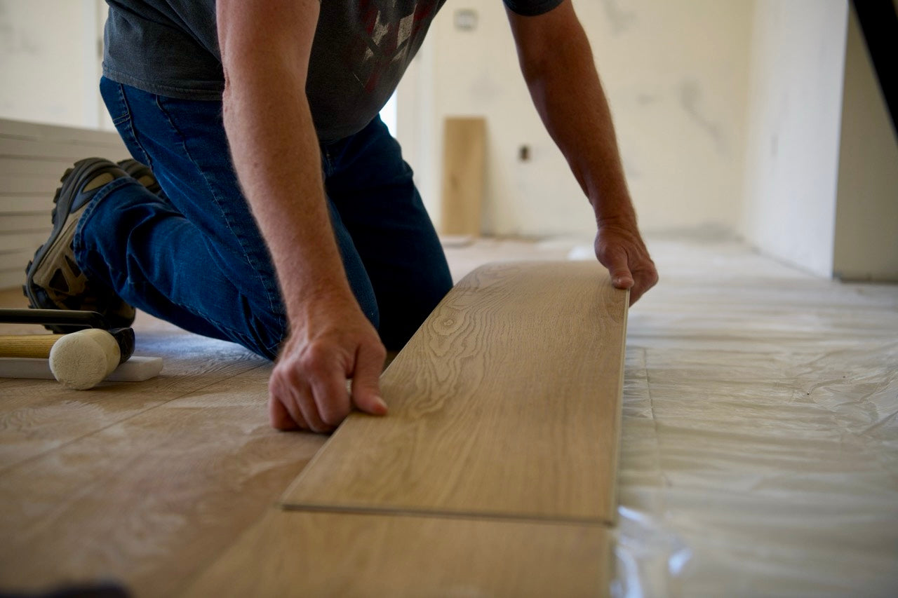 Installation of Hewn Stoneform Elite Flooring aligning plank rows