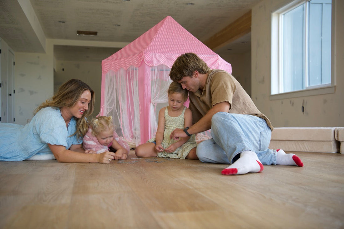 Family playing together on a Hewn Stoneform Floor in the color Golden from the Becki Owens Elite Stoneform Collection
