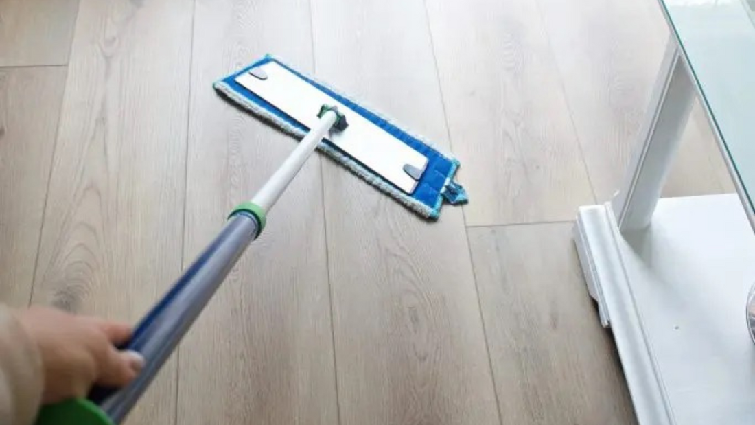 Cleaning Stoneform® flooring with a microfiber mop. 