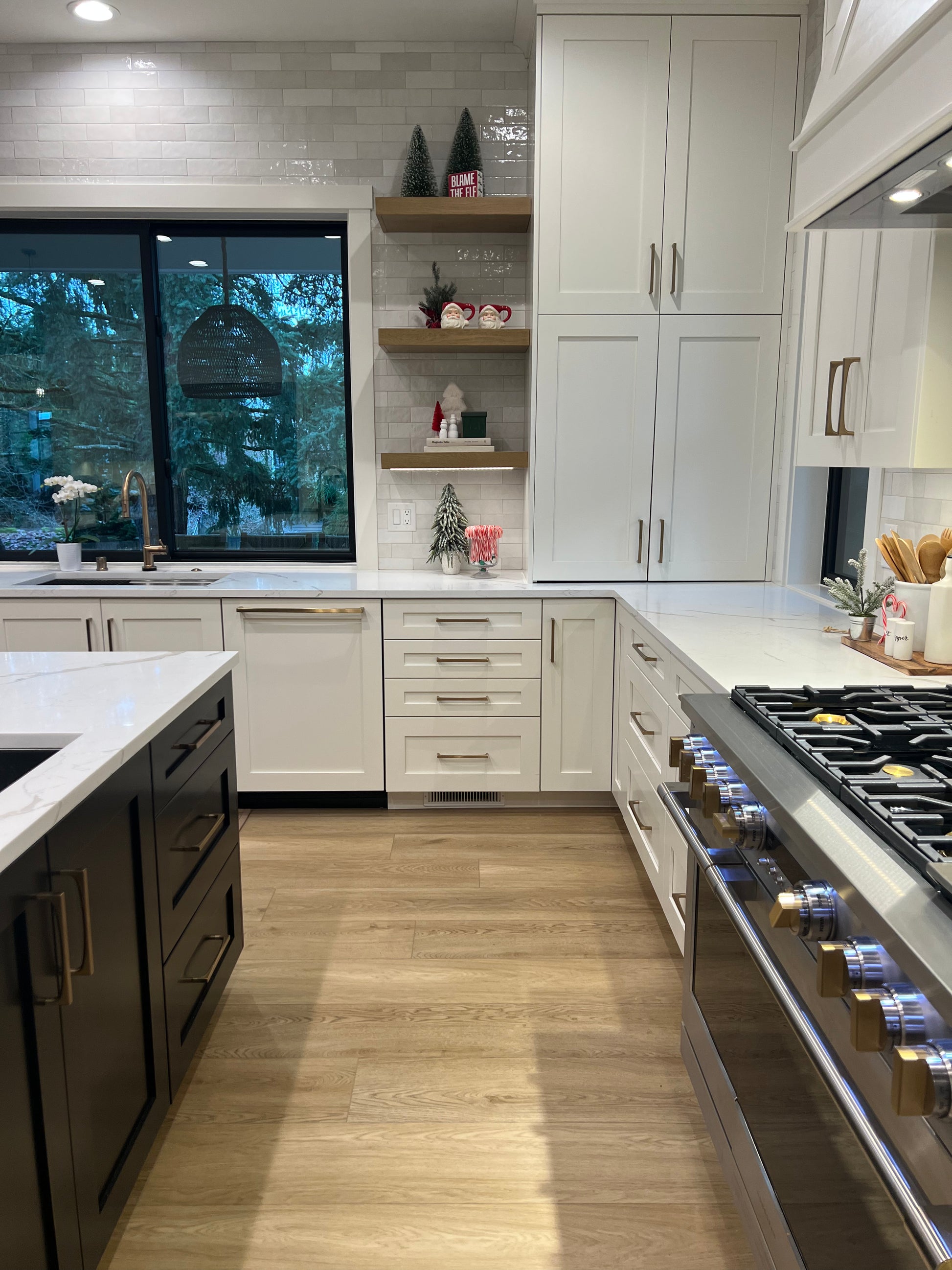 Photo of Honey Becki Owens Elite Stoneform Flooring in an kitchen with an island