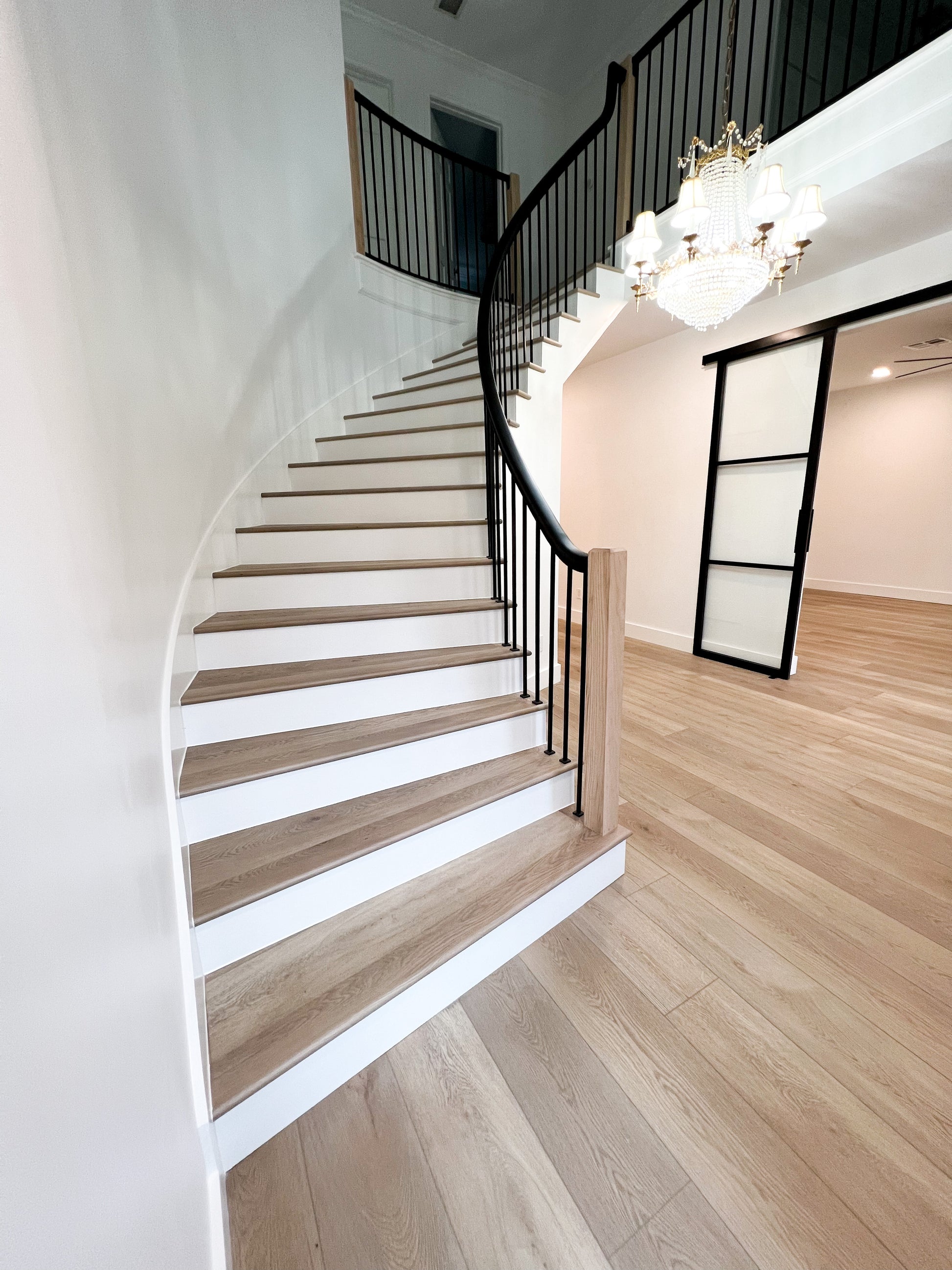 Photo of Rustic Becki Owens Elite Stoneform Flooring set by a staircase
