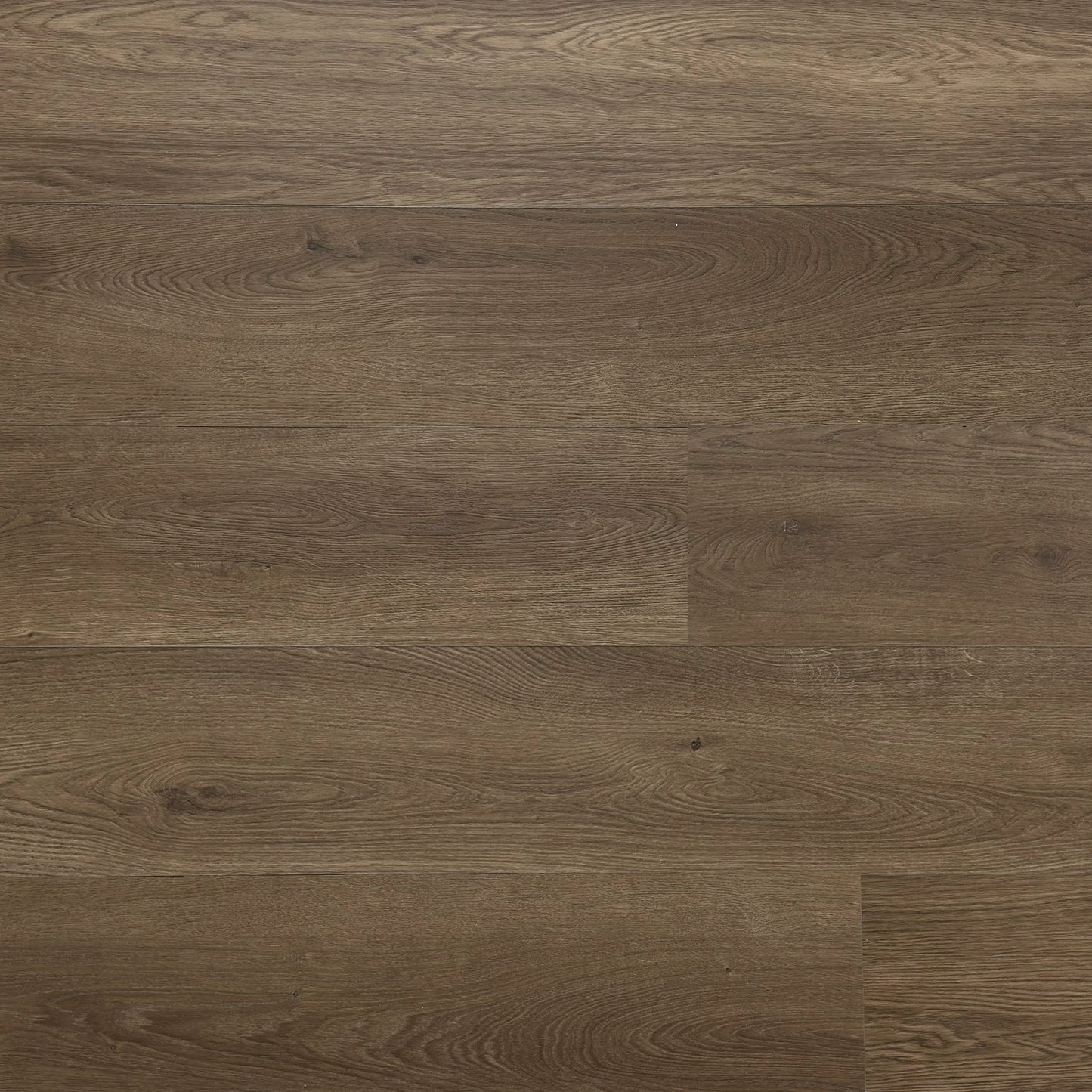 A photo swatch of the flooring color Antique from the Hewn Floor Becki Owens Elite Stoneform Luxury Plank Flooring Collection