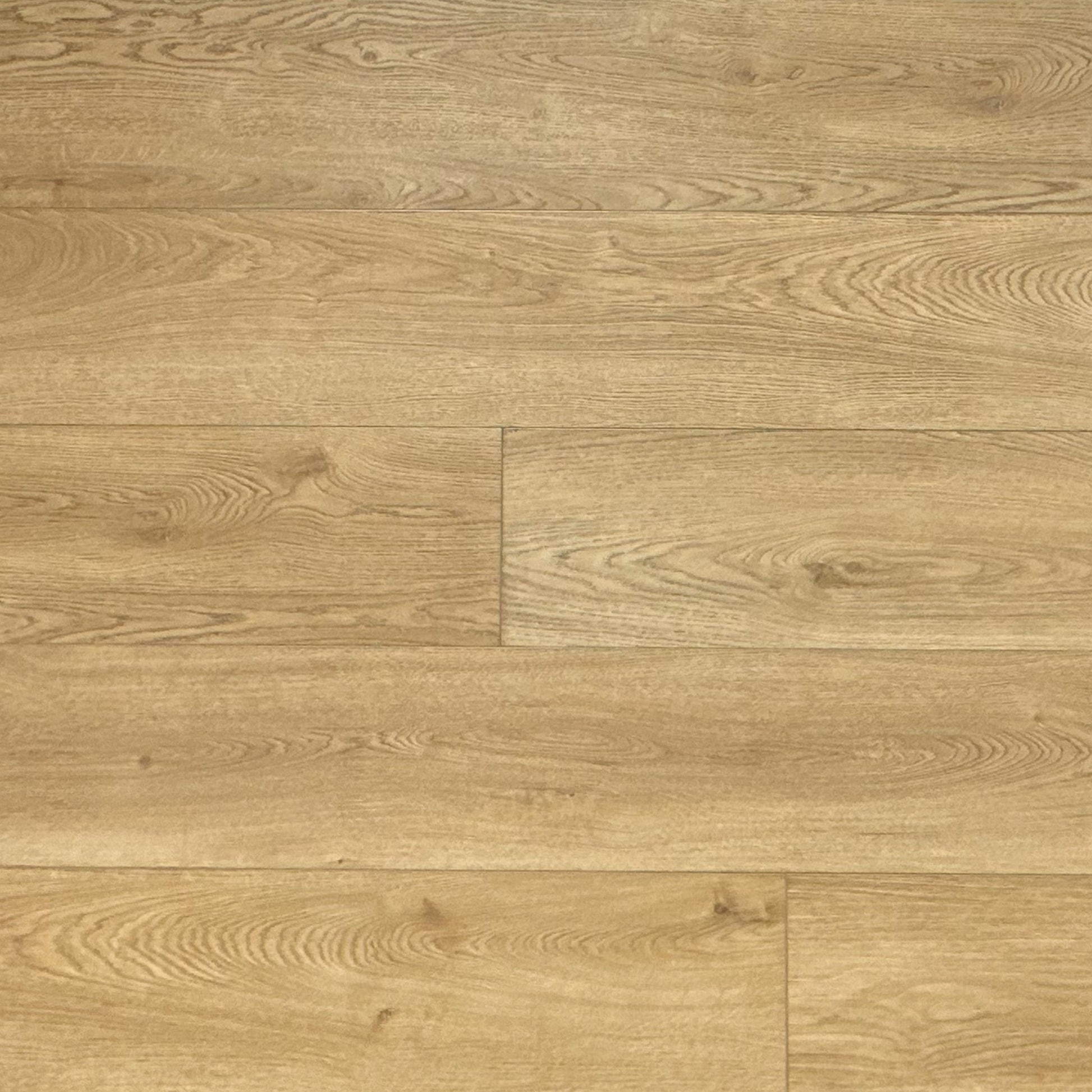 A photo swatch of the flooring color Golden from the Hewn Floor Becki Owens Elite Stoneform Luxury Plank Flooring Collection