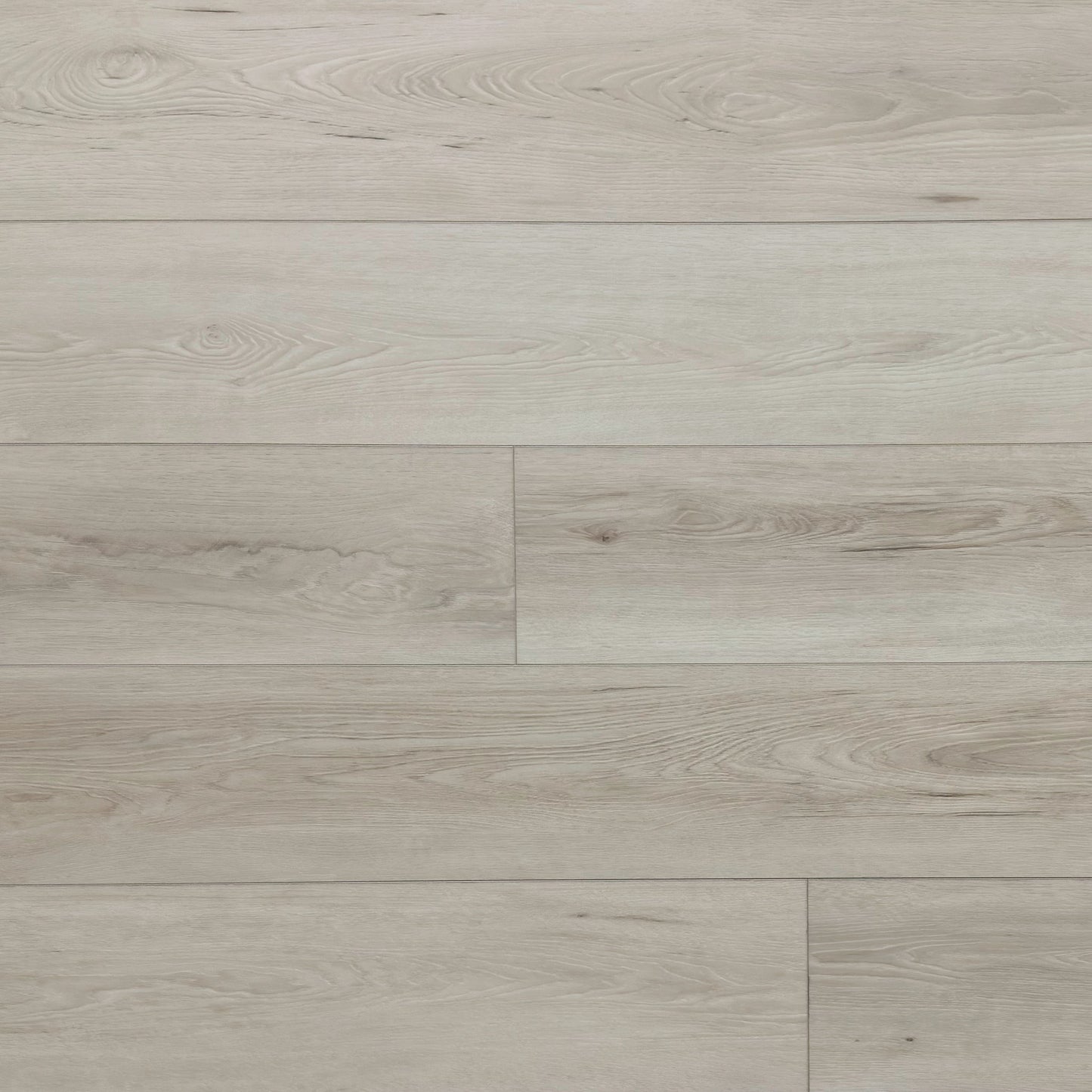 A photo swatch of the flooring color Riviera from the Hewn Floor Becki Owens Elite Stoneform Luxury Plank Flooring Collection