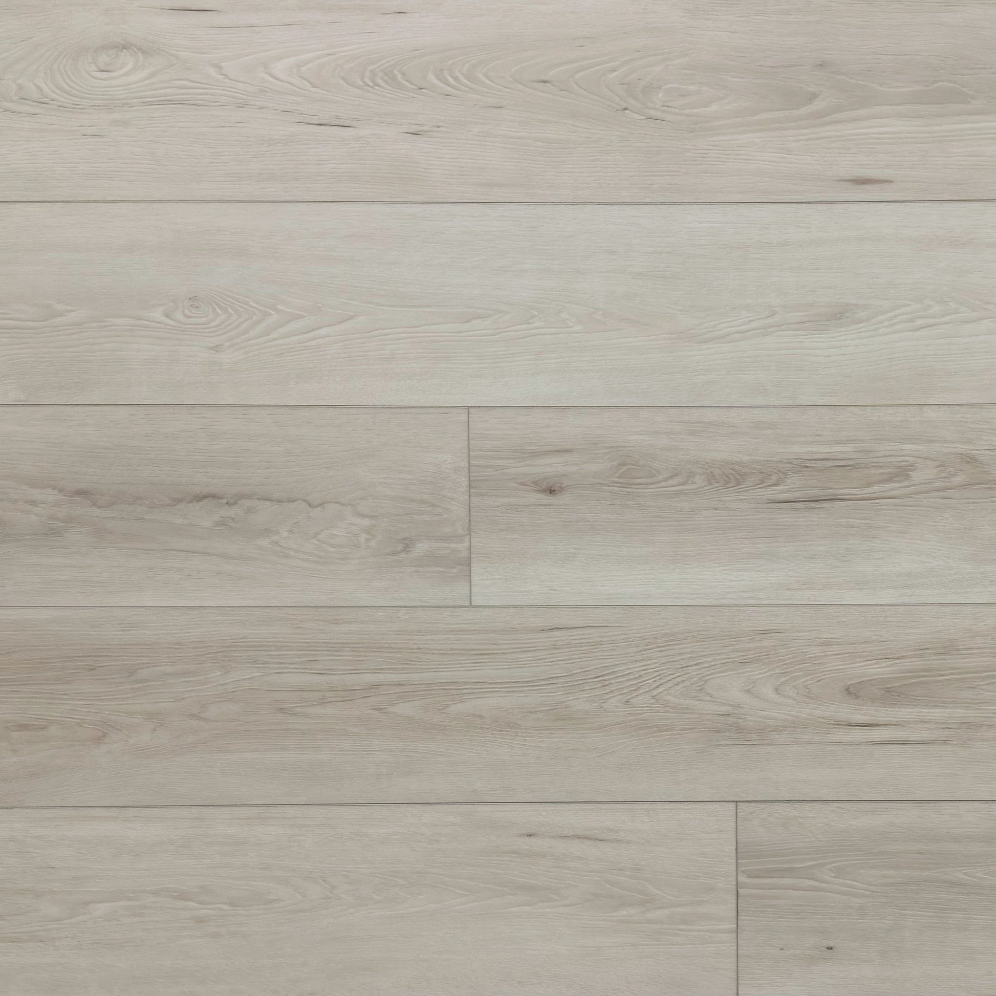 A photo swatch of the flooring color Riviera from the Hewn Floor Becki Owens Elite Stoneform Luxury Plank Flooring Collection