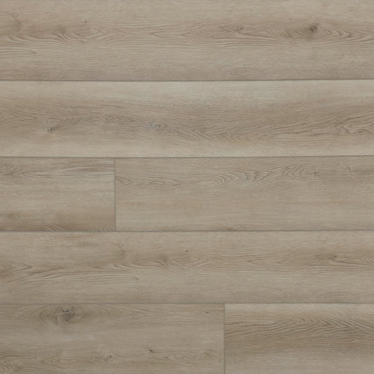 A photo swatch of the flooring color Shore from the Hewn Floor Angela Rose Elite Stoneform Luxury Plank Flooring Collection
