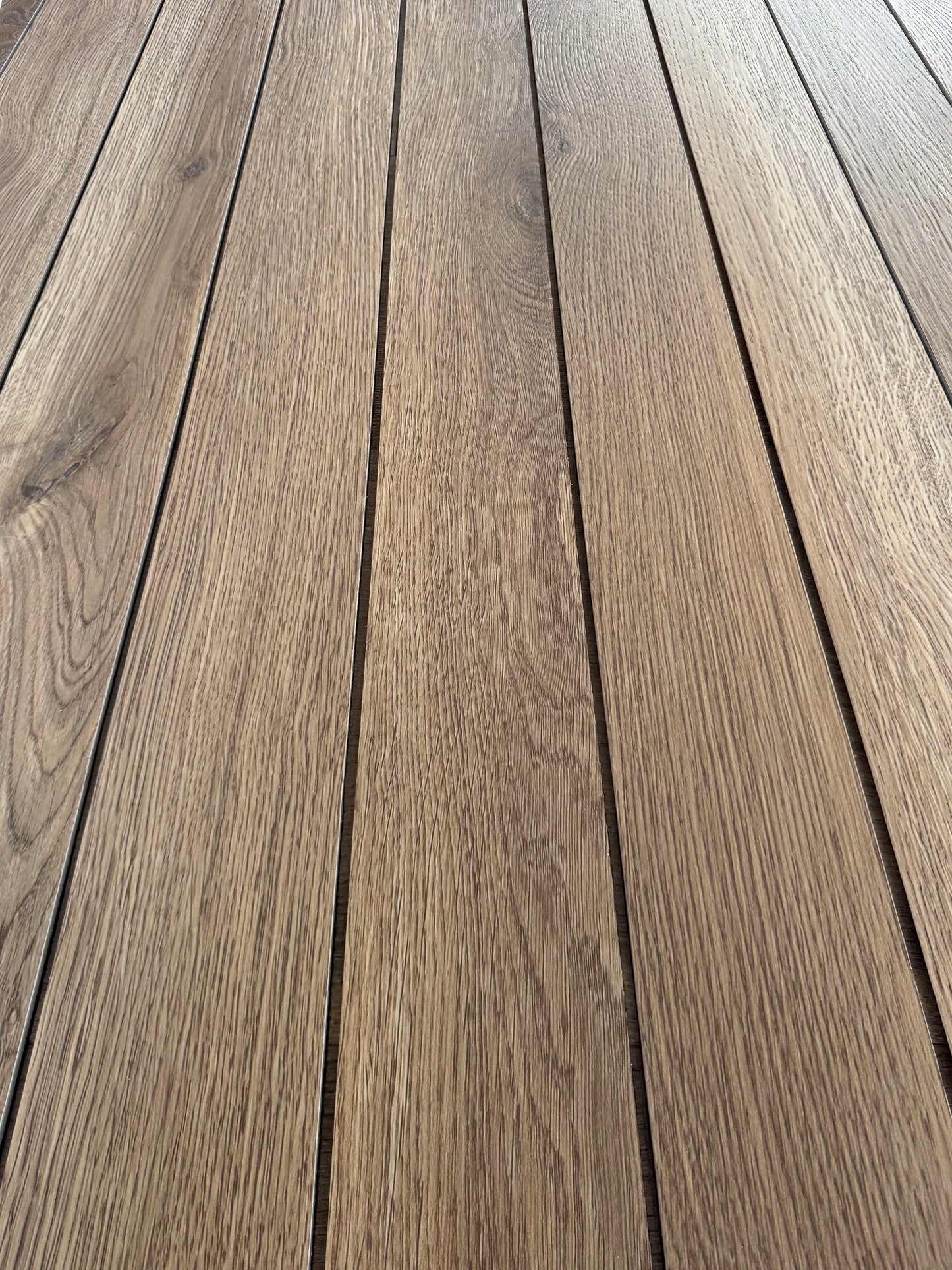 A closeup photo of cut pieces of Hewn's Galey Alix Elite Stoneform for Walls and Ceilings in the color Archer.