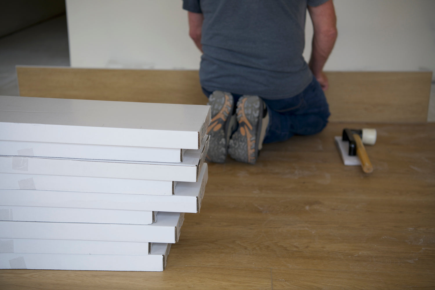 Installation of Hewn Stoneform Elite Flooring with Boxes in Foreground